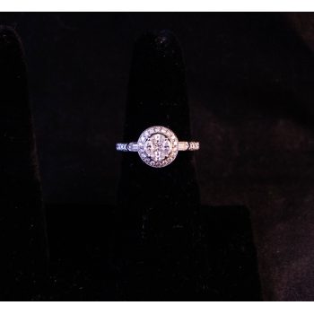 18k white gold and diamond cluster ring. Four marquis cut diamonds surround a princess cut centre diamond with baguette and round diamond shoulders. Total diamond .84ct, size L 1/2. Price includes nationwide delivery.