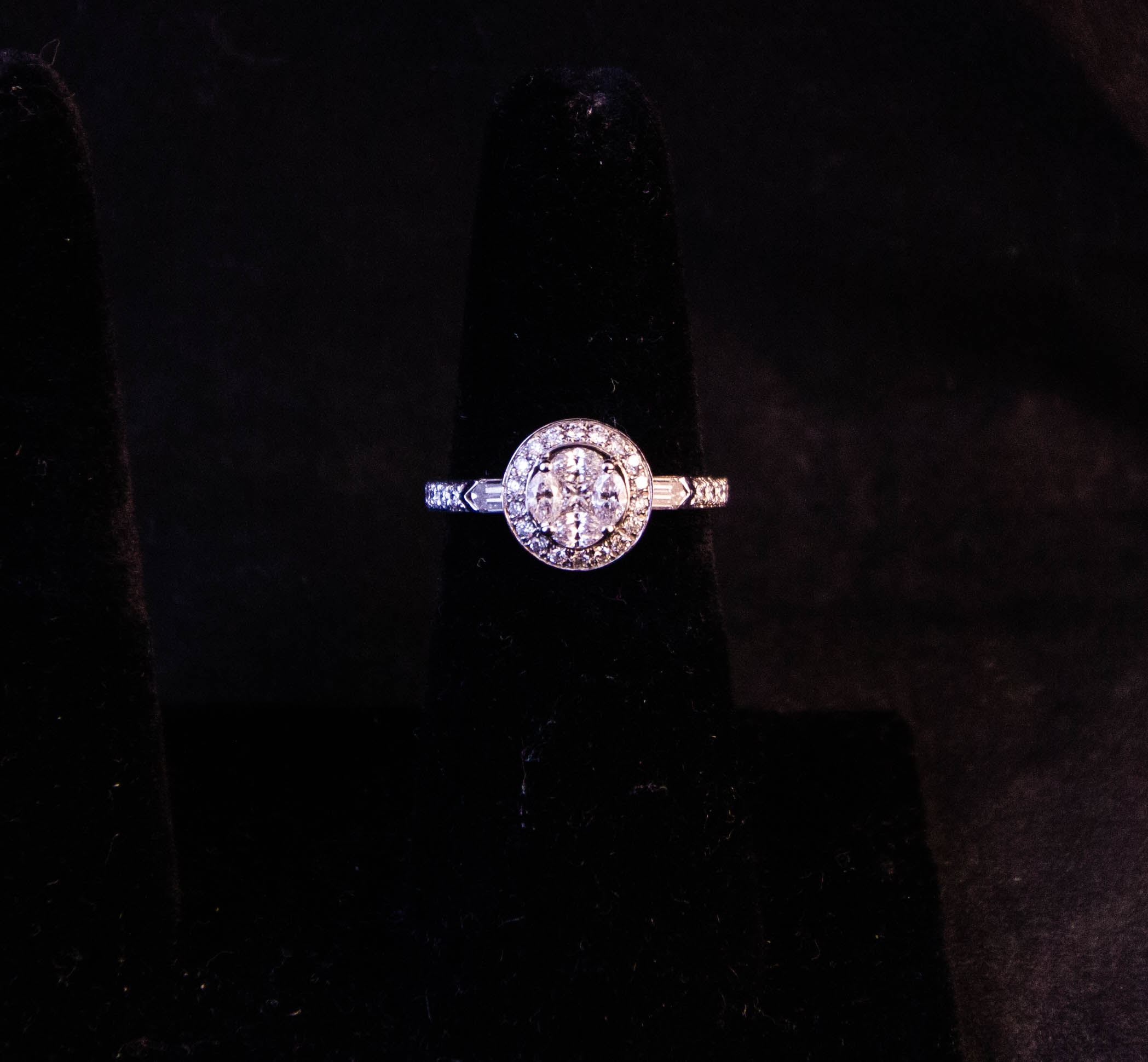 IMG_0701 18k white gold and diamond cluster ring. Four marquis cut diamonds surround a princess cut centre diamond with baguette and round diamond shoulders. Total diamond .84ct, size L 1/2. Price includes nationwide delivery.