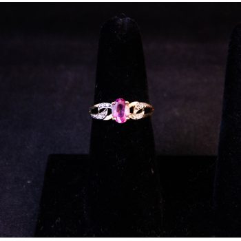 9k yellow gold pink sapphire dress ring. Size N Price includes nationwide delivery